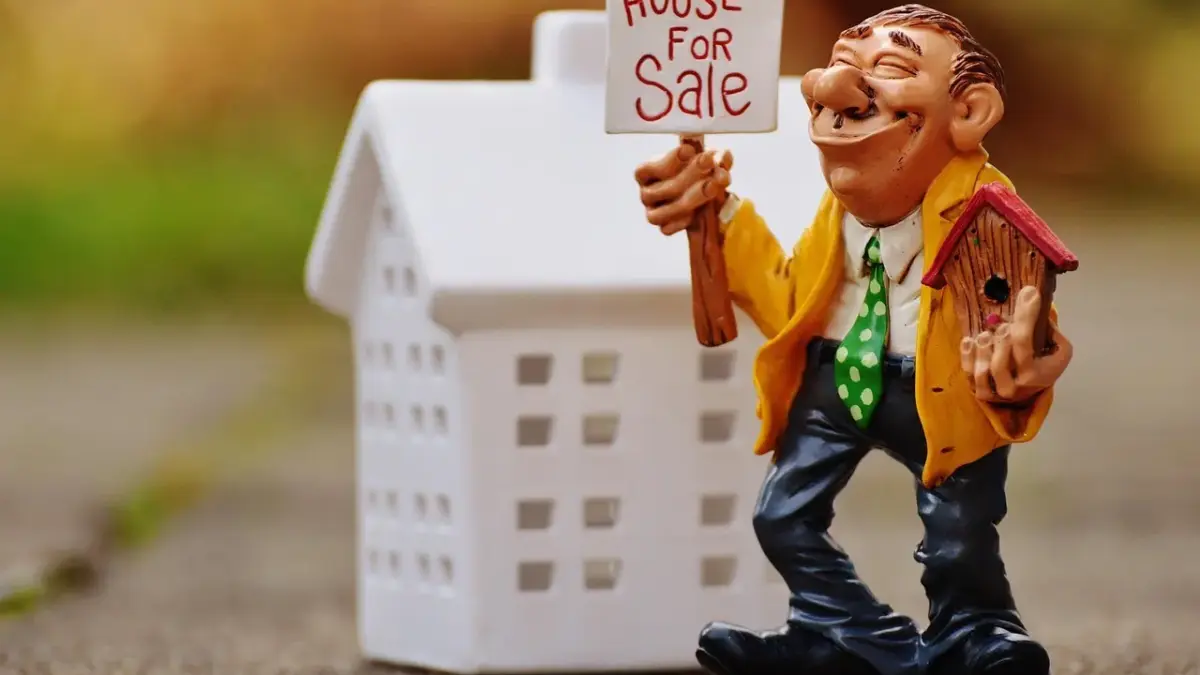 Hvad tjener en ejendomsmægler? Afsløringer, gennemsnit og tips til at maksimere din indtjening